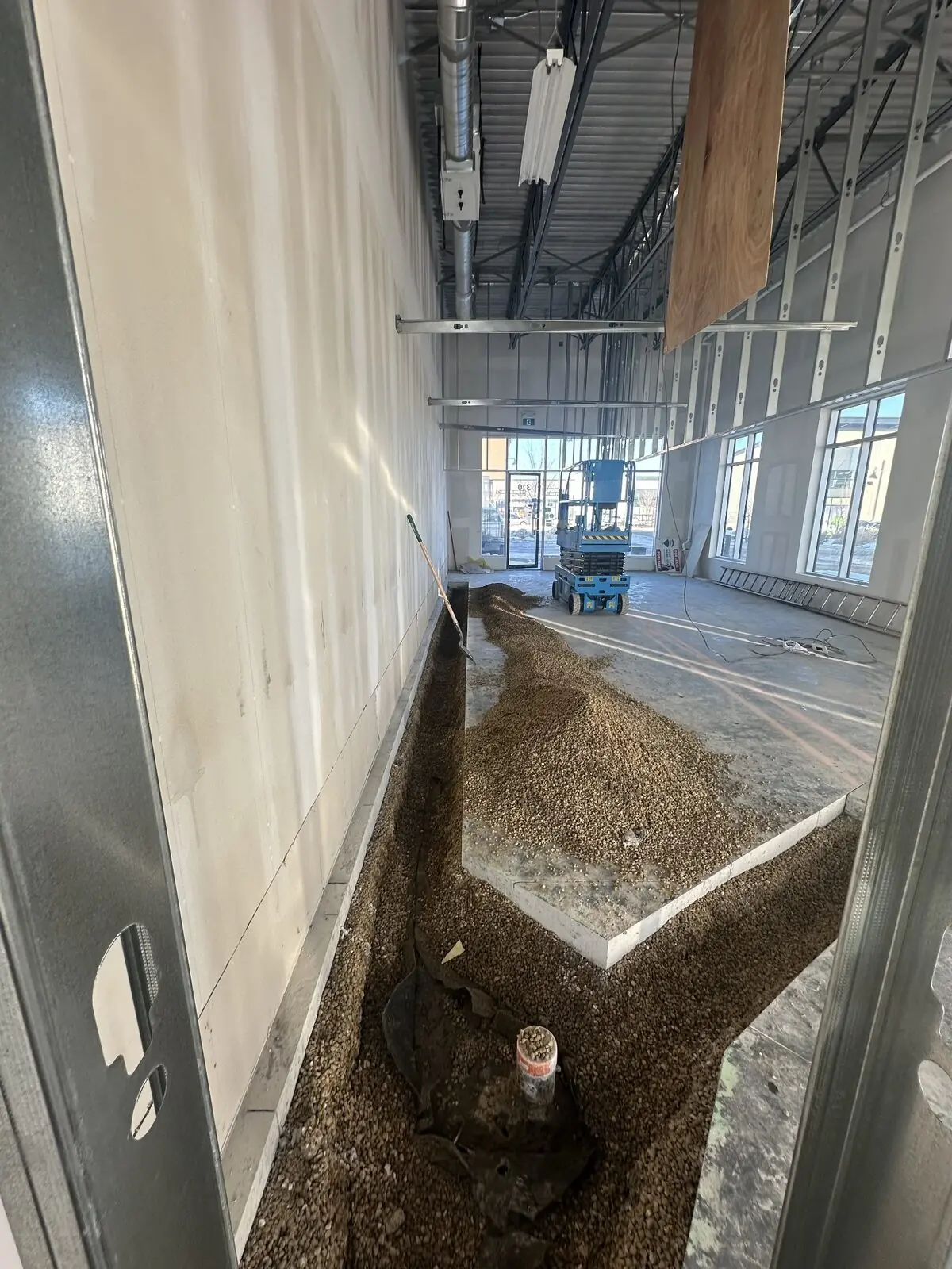 Underground drainage rough-in during a commercial tenant improvement