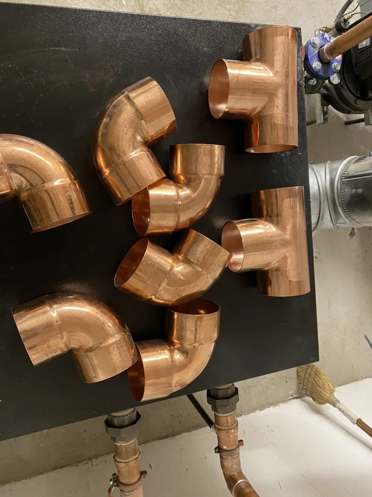 Commercial copper fittings prepared for plumbing installation